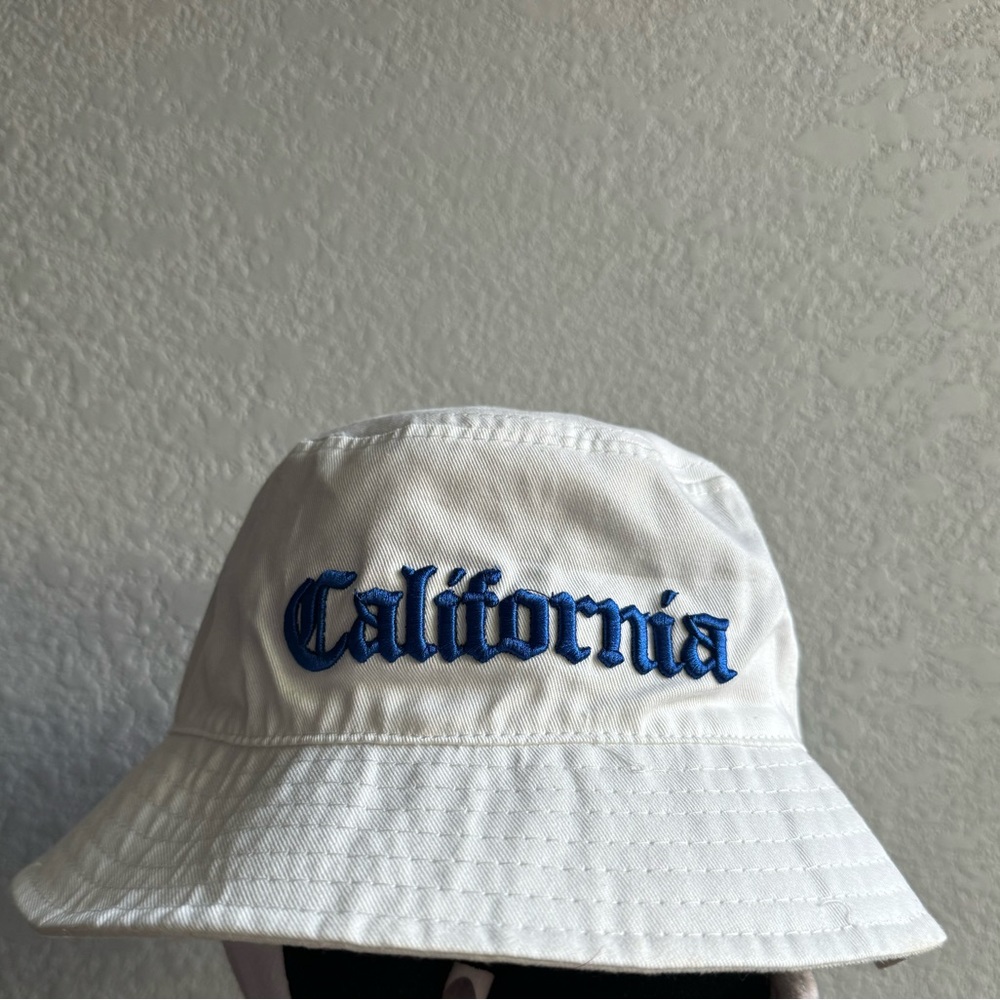 White bucket hat